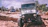 A rugged Jeep Wrangler JK climbing rocky terrain in South Africa, dust trailing behind.