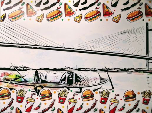 A stylized image of a boat on a body of water, with a cable-stayed bridge in the background. The boat has a covered section and appears to be a traditional wooden vessel. The image is surrounded by a playful and colorful border that features illustrations of various fast-food items, including burgers, pizza slices, french fries, and soft drinks.