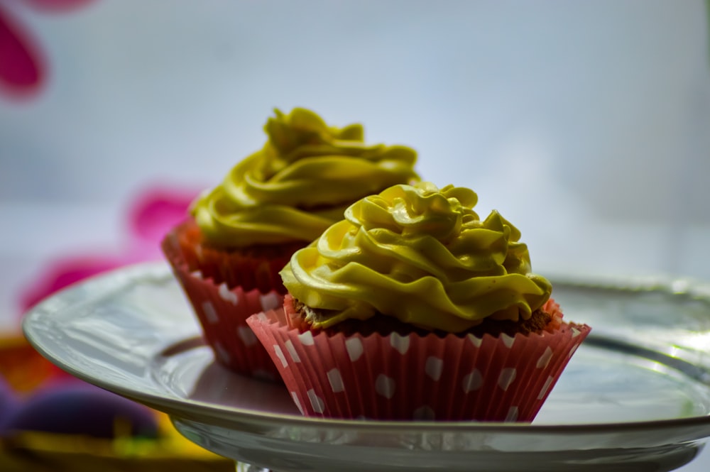 two yellow cupcakes
