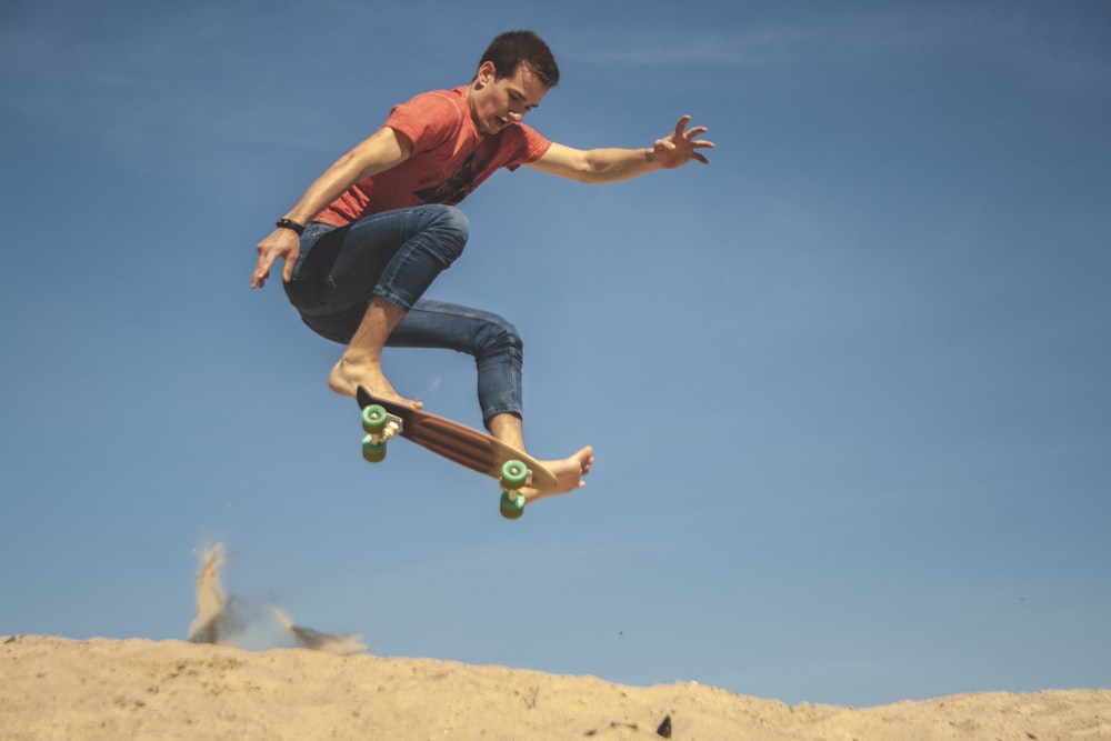 man doing tricks while riding on skateboard