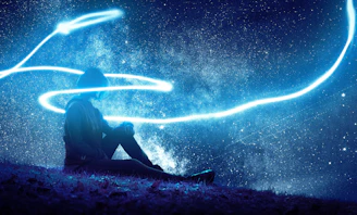 person seated on grass