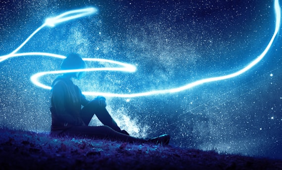 person seated on grass