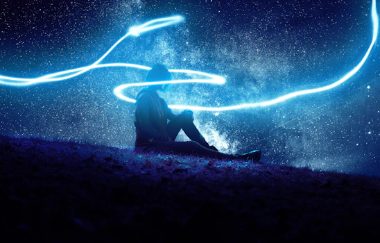 A serene scene showing a person meditating under a starry night sky, surrounded by soft glowing symbols of astrology and healing.