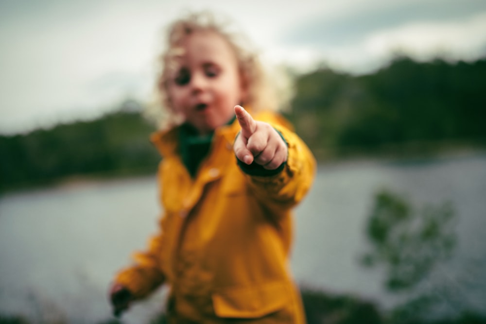 girl in orange jacket