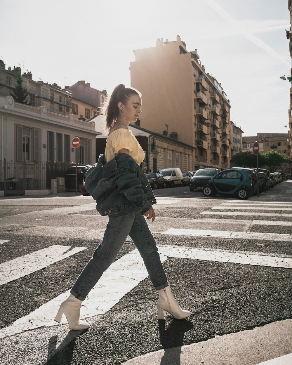 woman walking on road