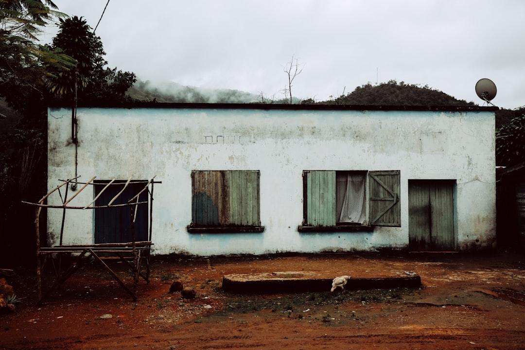 white concrete 1-storey house