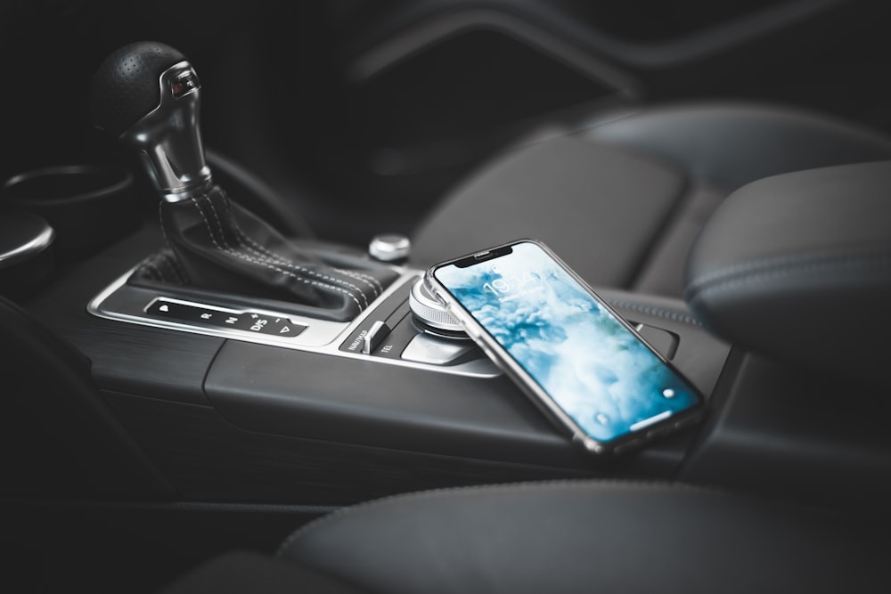 smartphone on vehicle hear shift lever