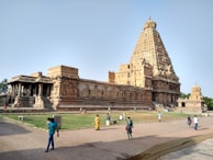 An ancient temple surrounded by lush greenery, showcasing cultural heritage.