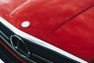 red Mercedes-Benz vehicle