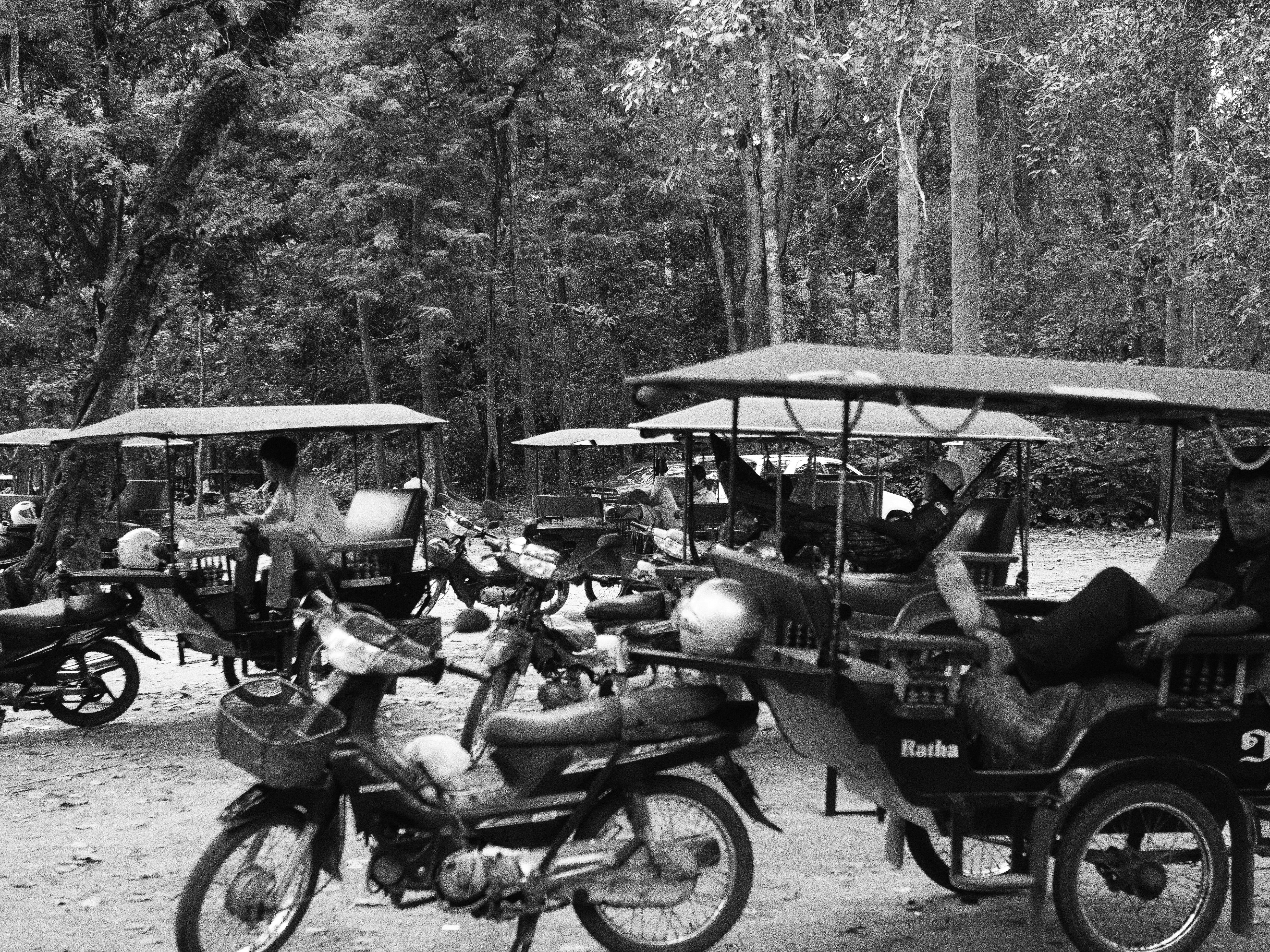 grayscale photo of motorcycles
