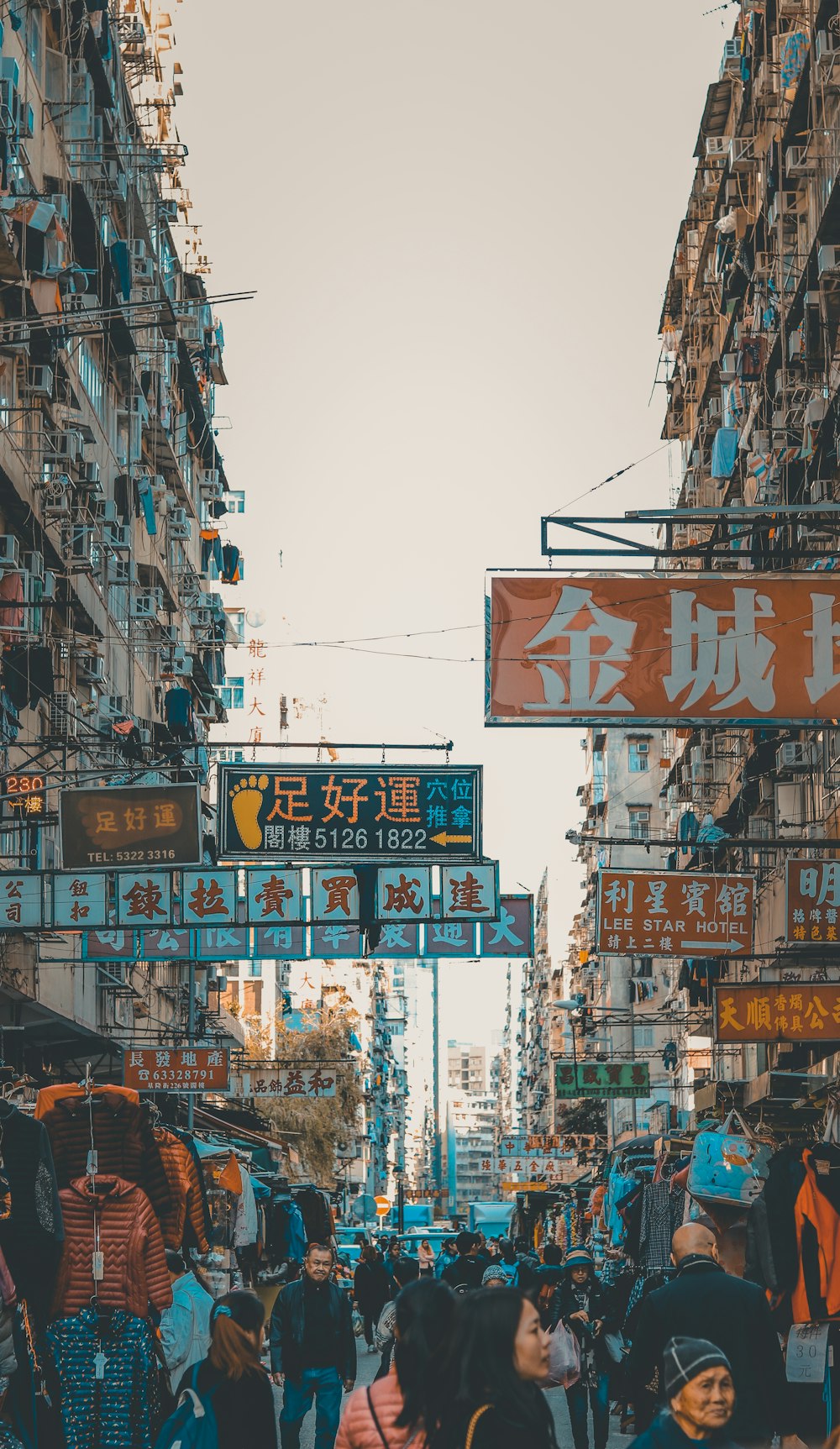 people walking on streets near buildings