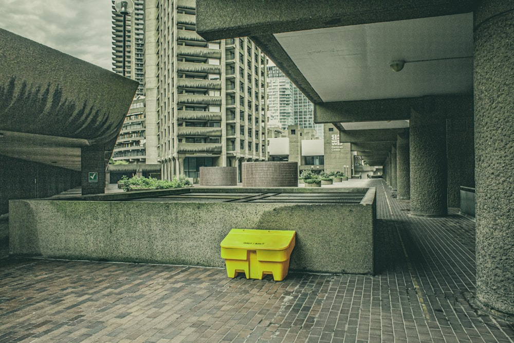 yellow trash bin
