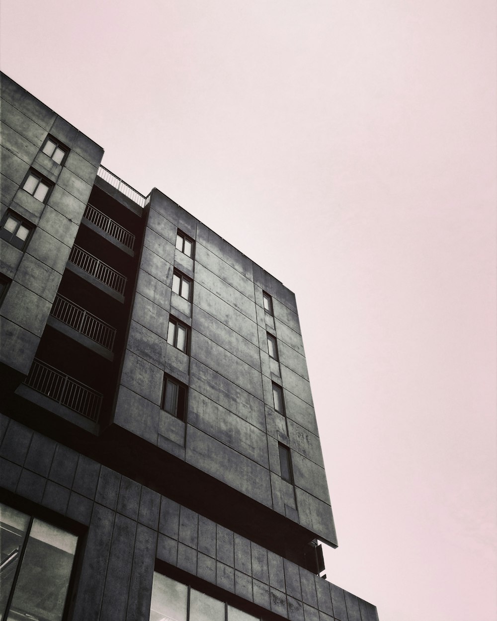 grey high rise building low angle photo