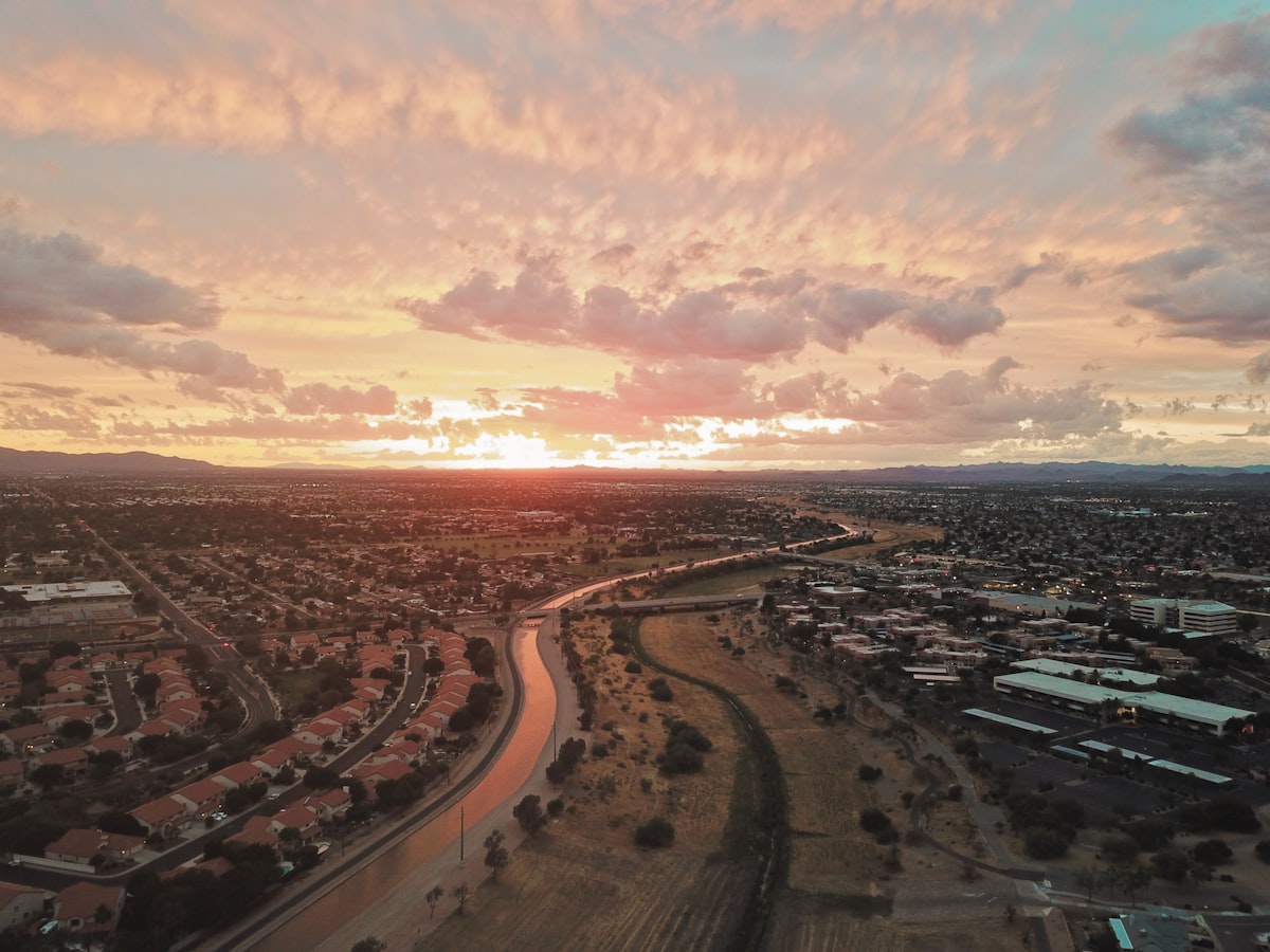 Aerial view of a suburban neighborhood with rows of homes