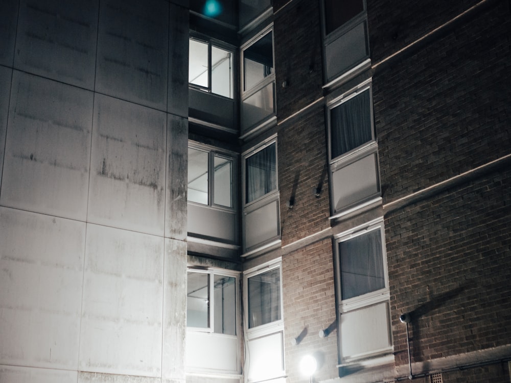 white and brown concrete buildings showing closed door