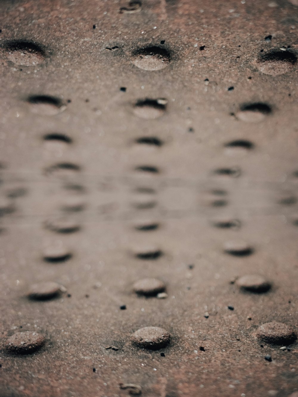 a close up of water droplets on a surface