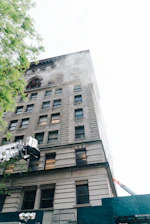 Restoration crew removing smoke damage from a residential property in Brooklyn.