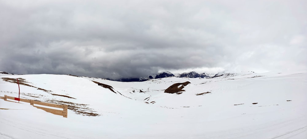 ground covered with snow during daytime