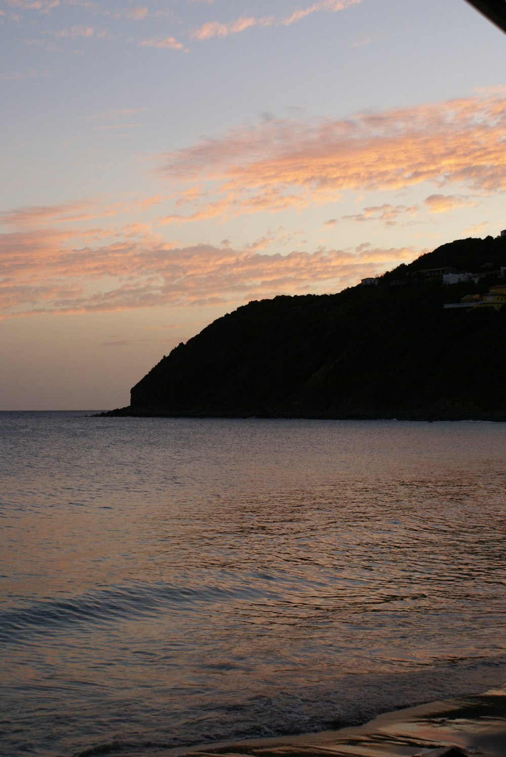 silhouette of hill during sunset