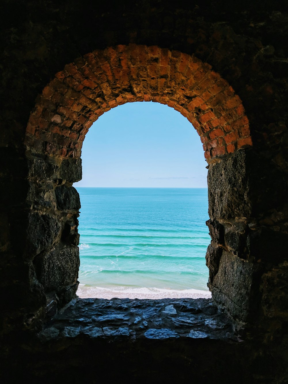 arch-shaped bricked wall