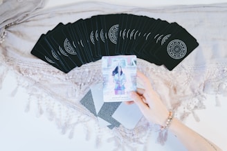 person holding printed paper