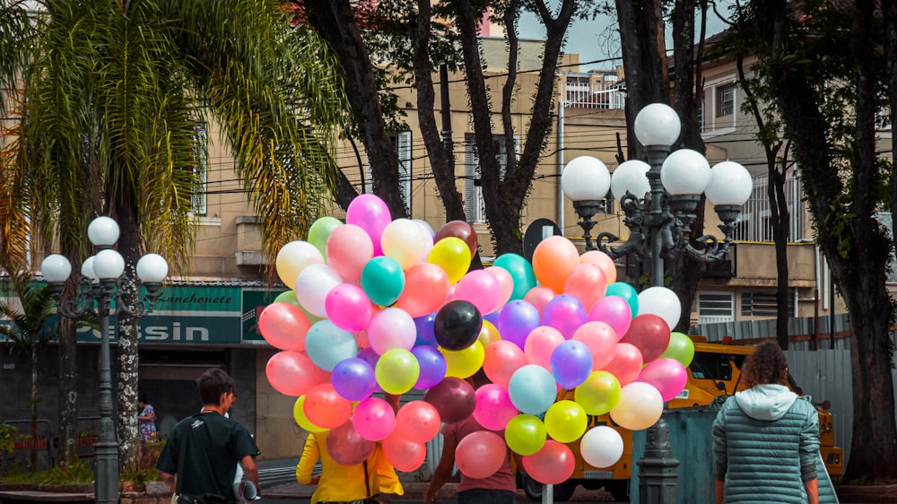 multicolored balloons during daytime