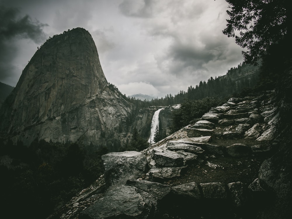 landscape photo of mountain under cloudy sky during daytime