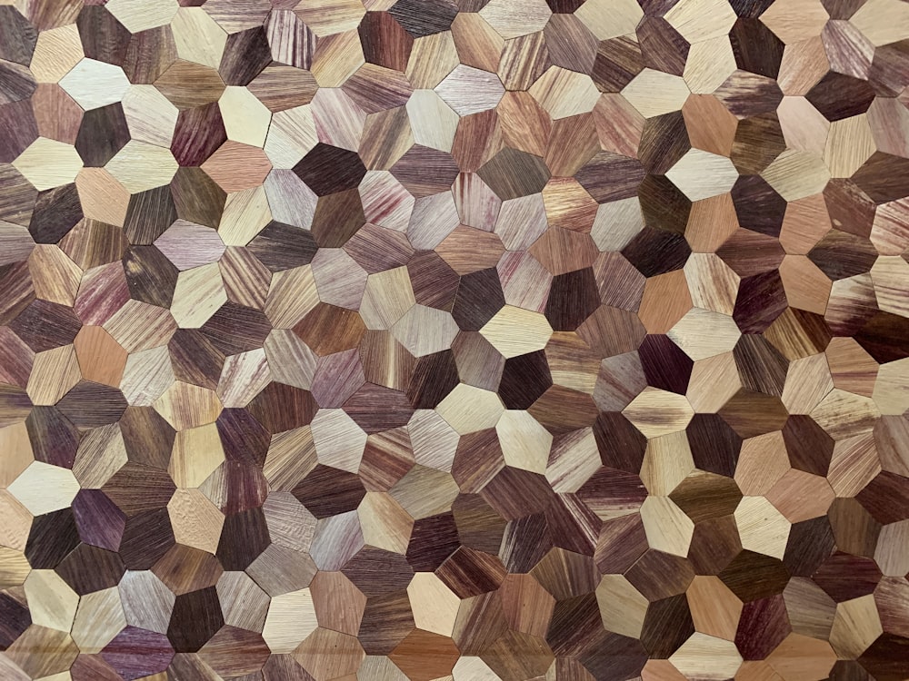 a close up of a rug made of wood