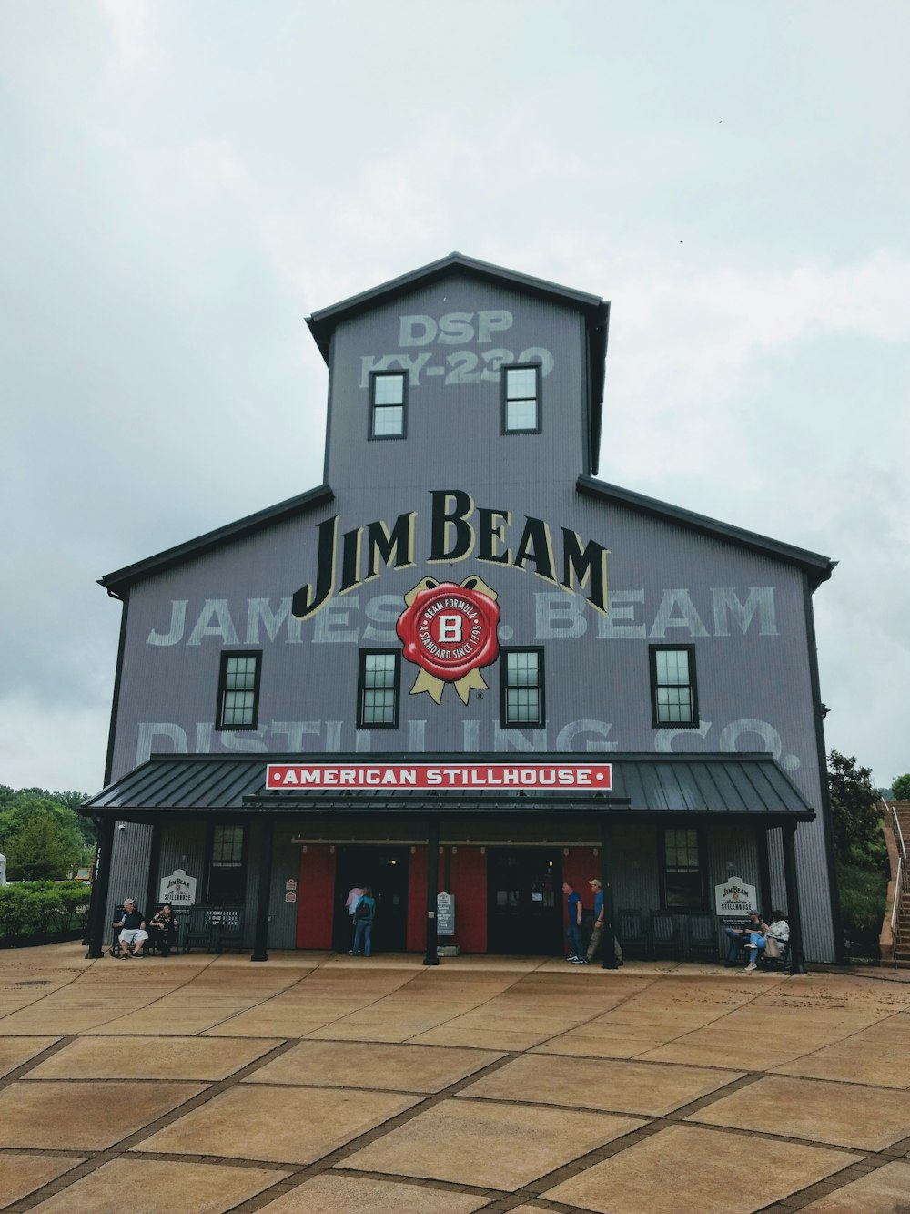 people walking near Jim Beam building