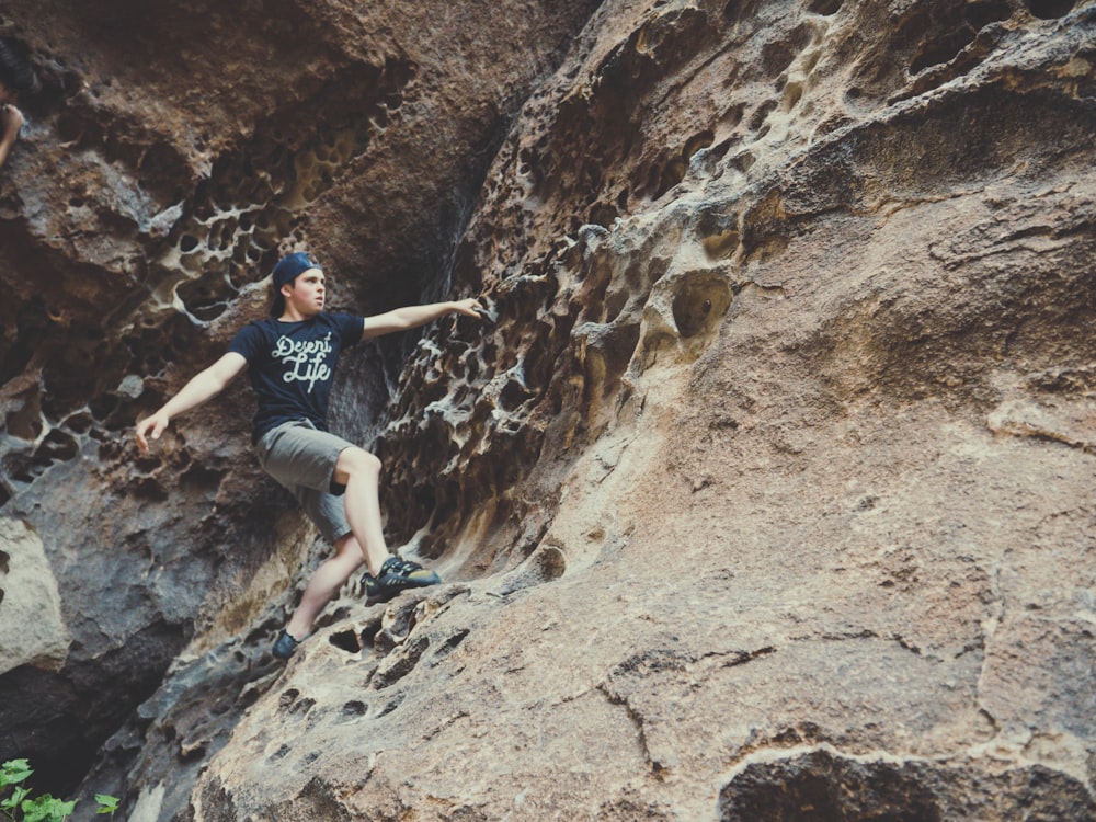 man on boulder