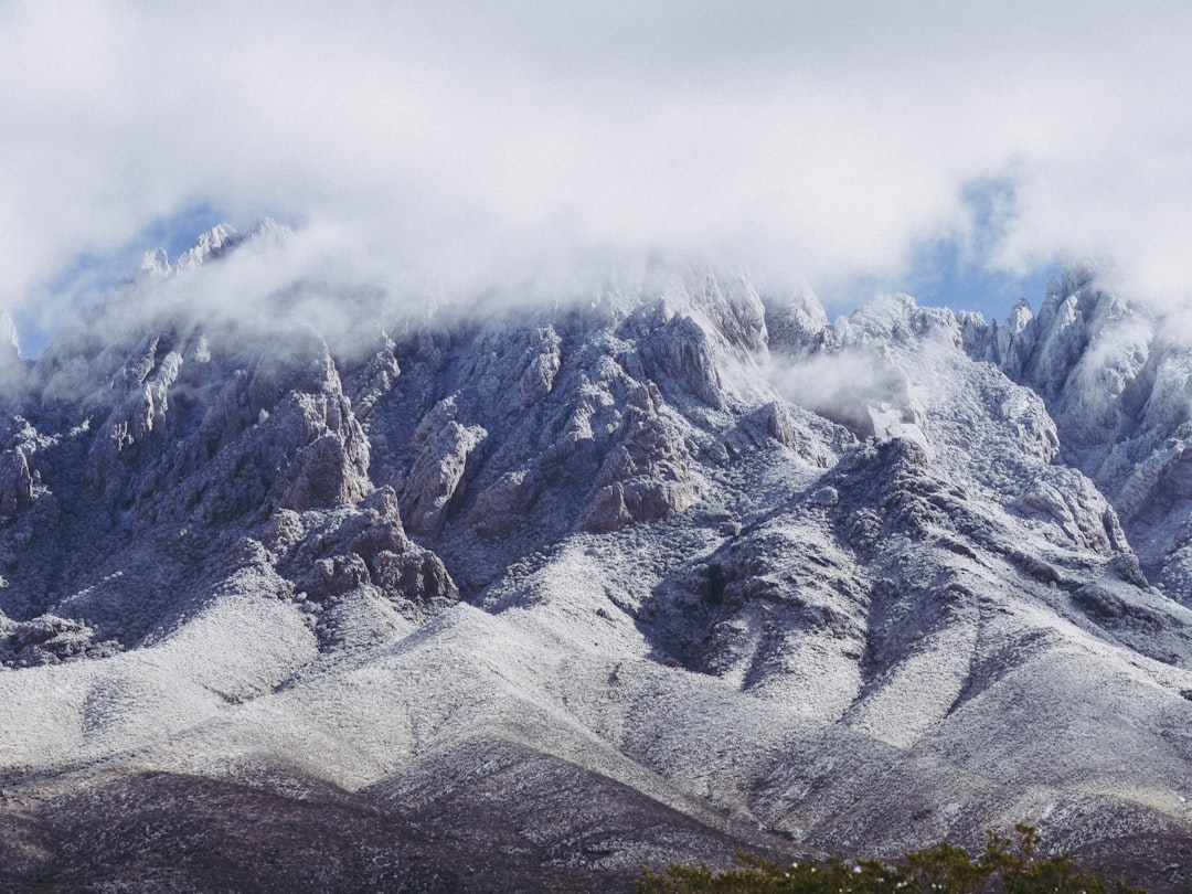 white cloud covering mountain peak