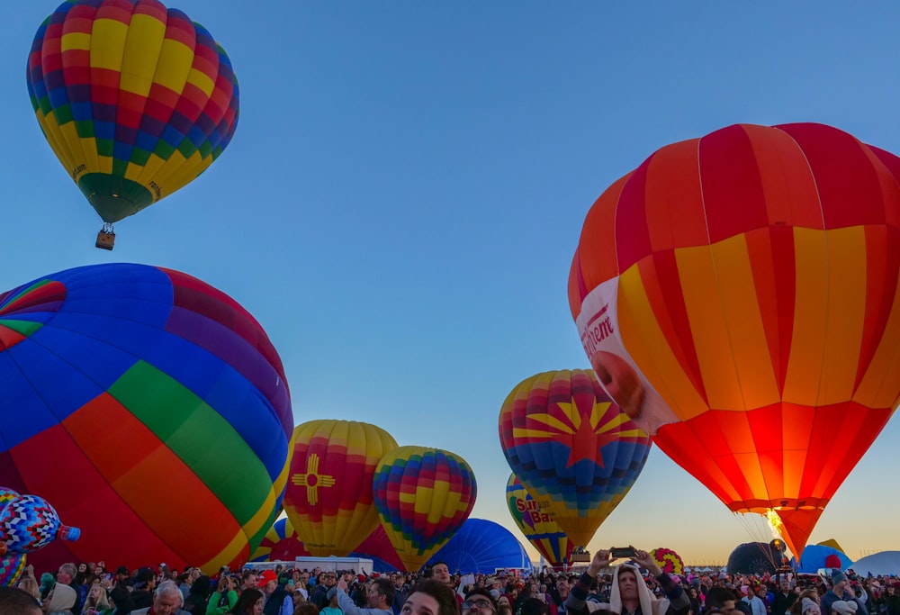 bunch of hot air balloons flying on sky