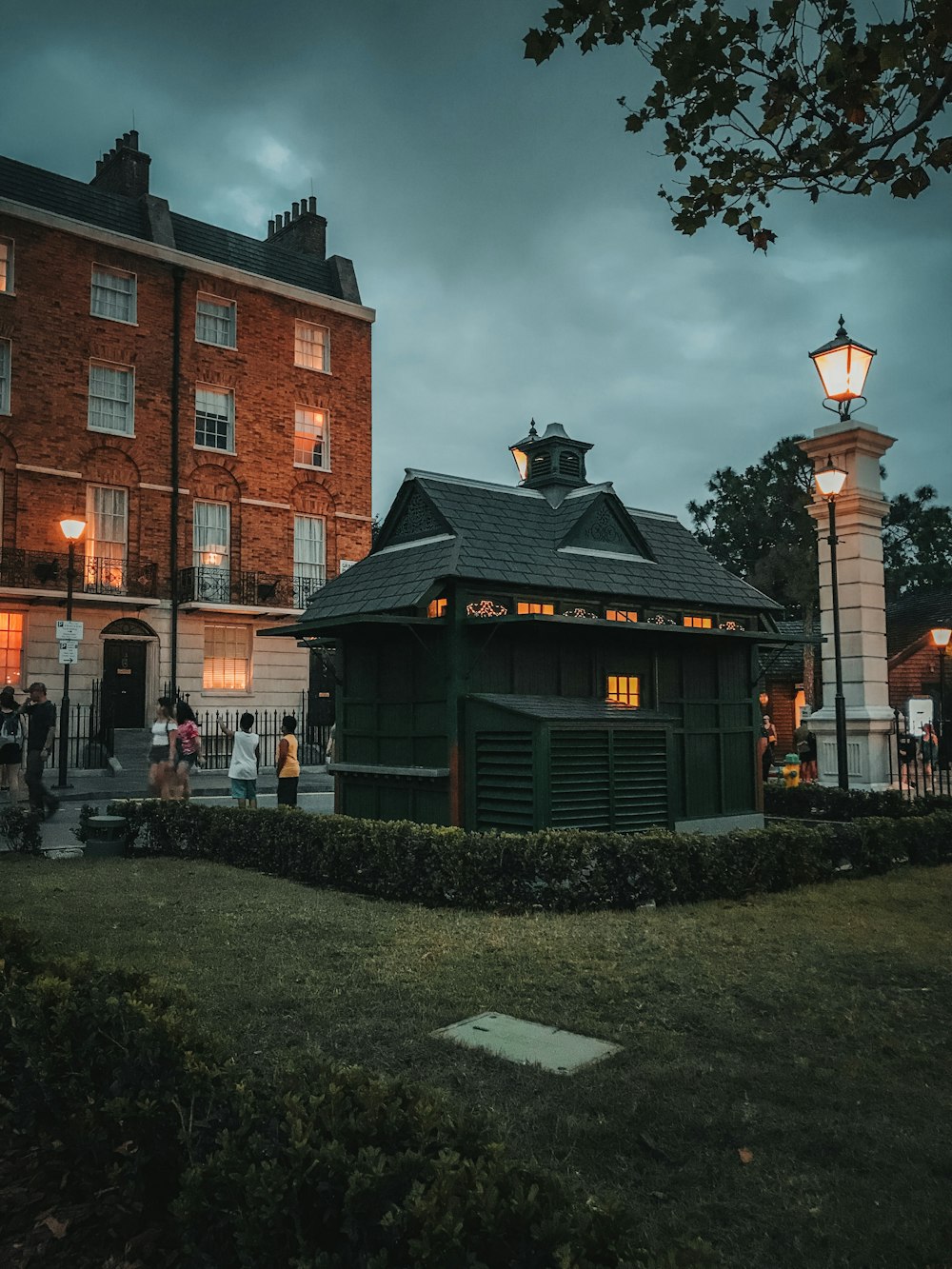 gray house near lamppost