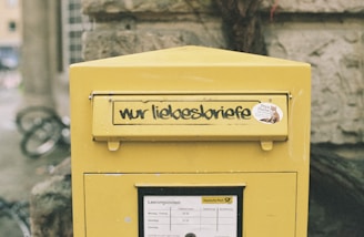 a yellow box with writing on the side of it
