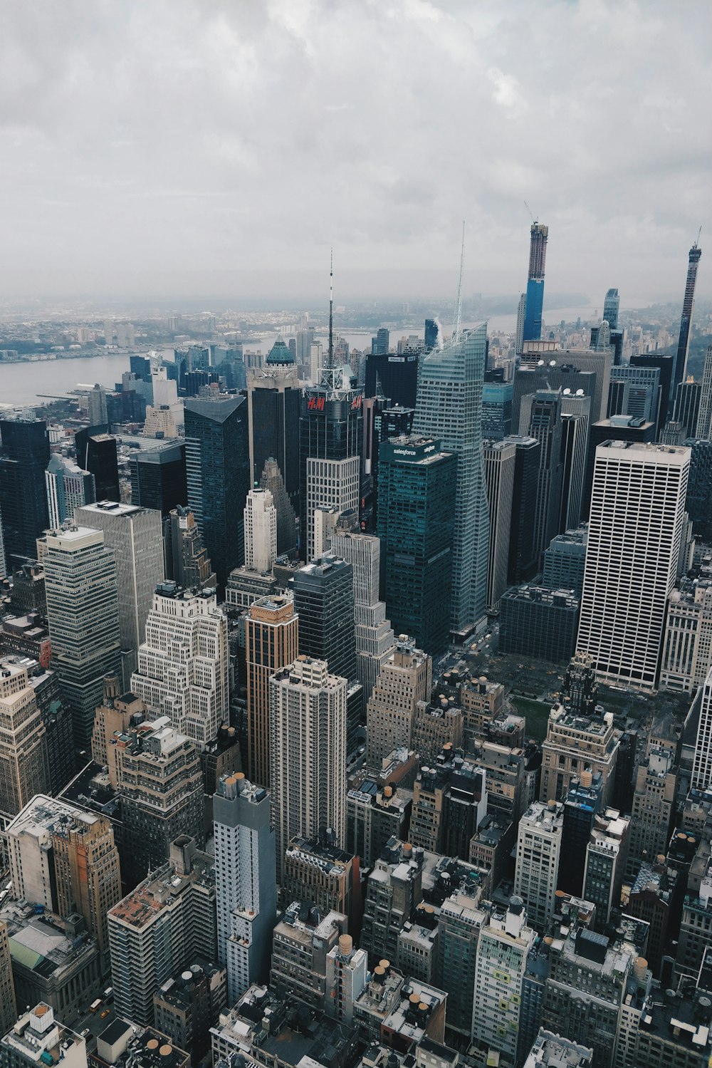 an aerial view of a city with tall buildings