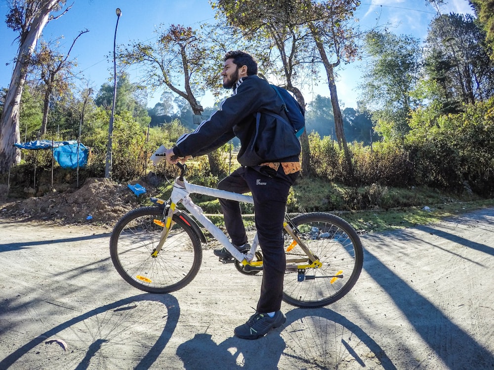 man riding bicycle