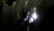 A person wearing protective gear, including a welding mask, is engaged in welding work on a large metallic surface. Bright sparks and a glow are emitted from the welding point, contrasting against the dark environment.