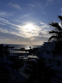 A serene massage room overlooking the calm sea at Port d'Andratx during sunset