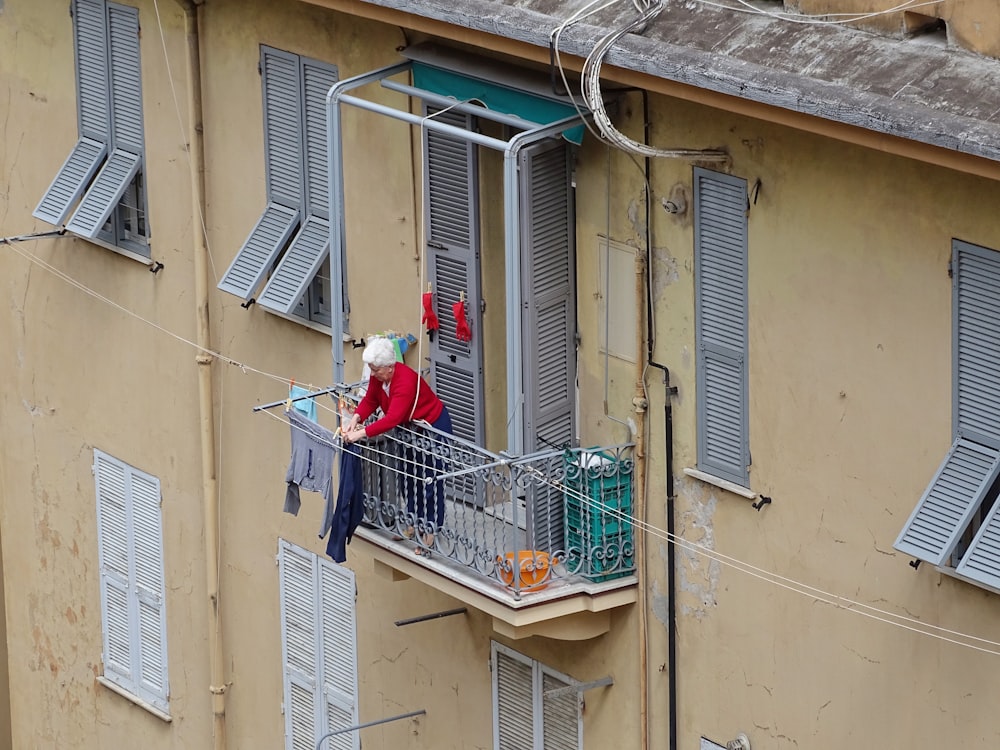 woman holding clothes on focus photography