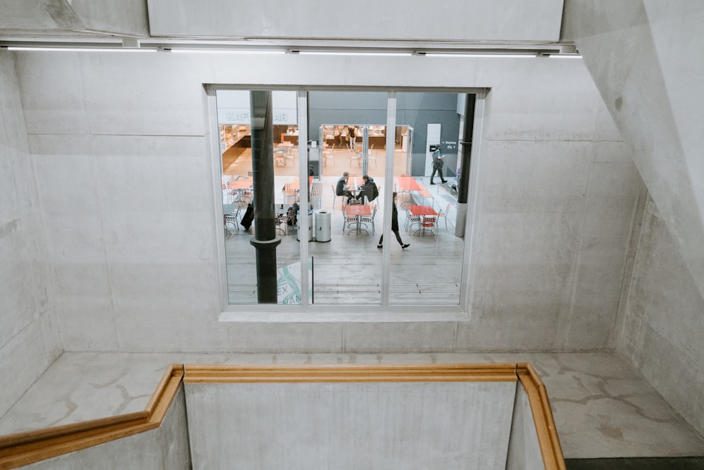 a group of people sitting at a table in a room