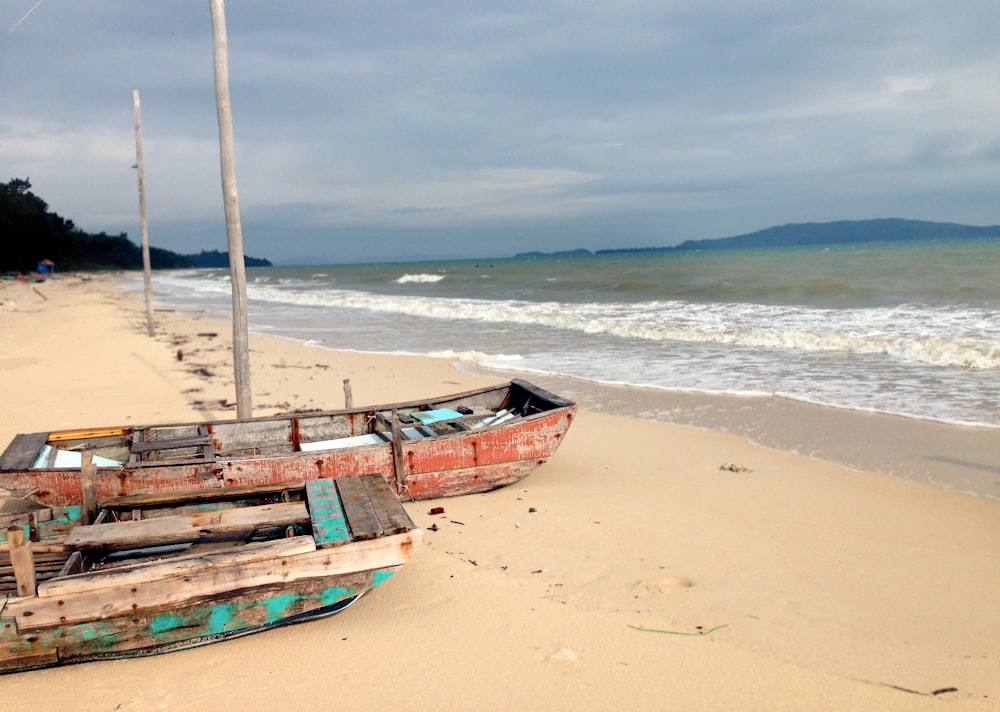 two green and red boats