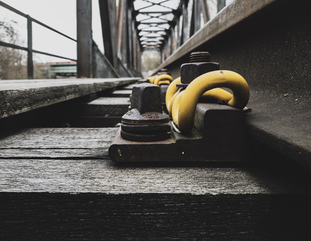 yellow and grey metal bolts