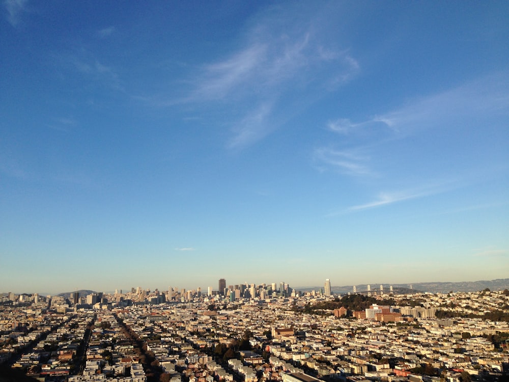 high-rise building under blue sky