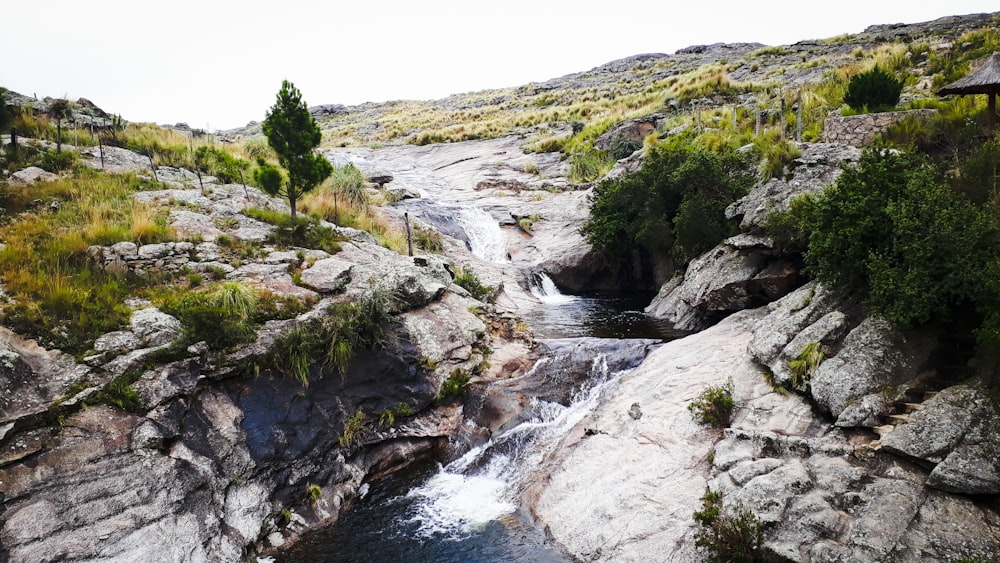 waterfalls raging through rocks