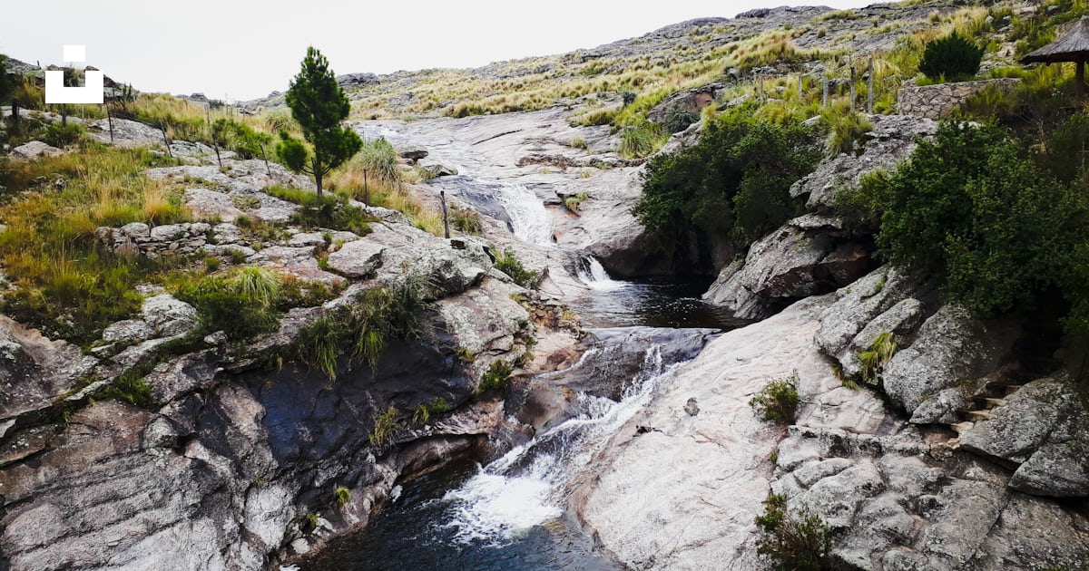 Waterfalls raging through rocks photo – Free Nature Image on Unsplash