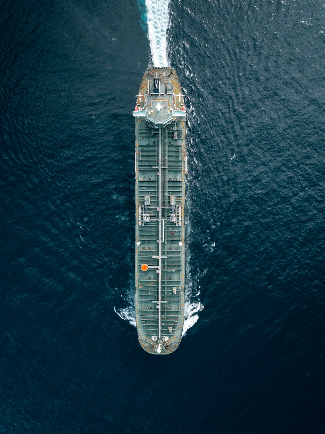 container ship cruising on the middle of the sea