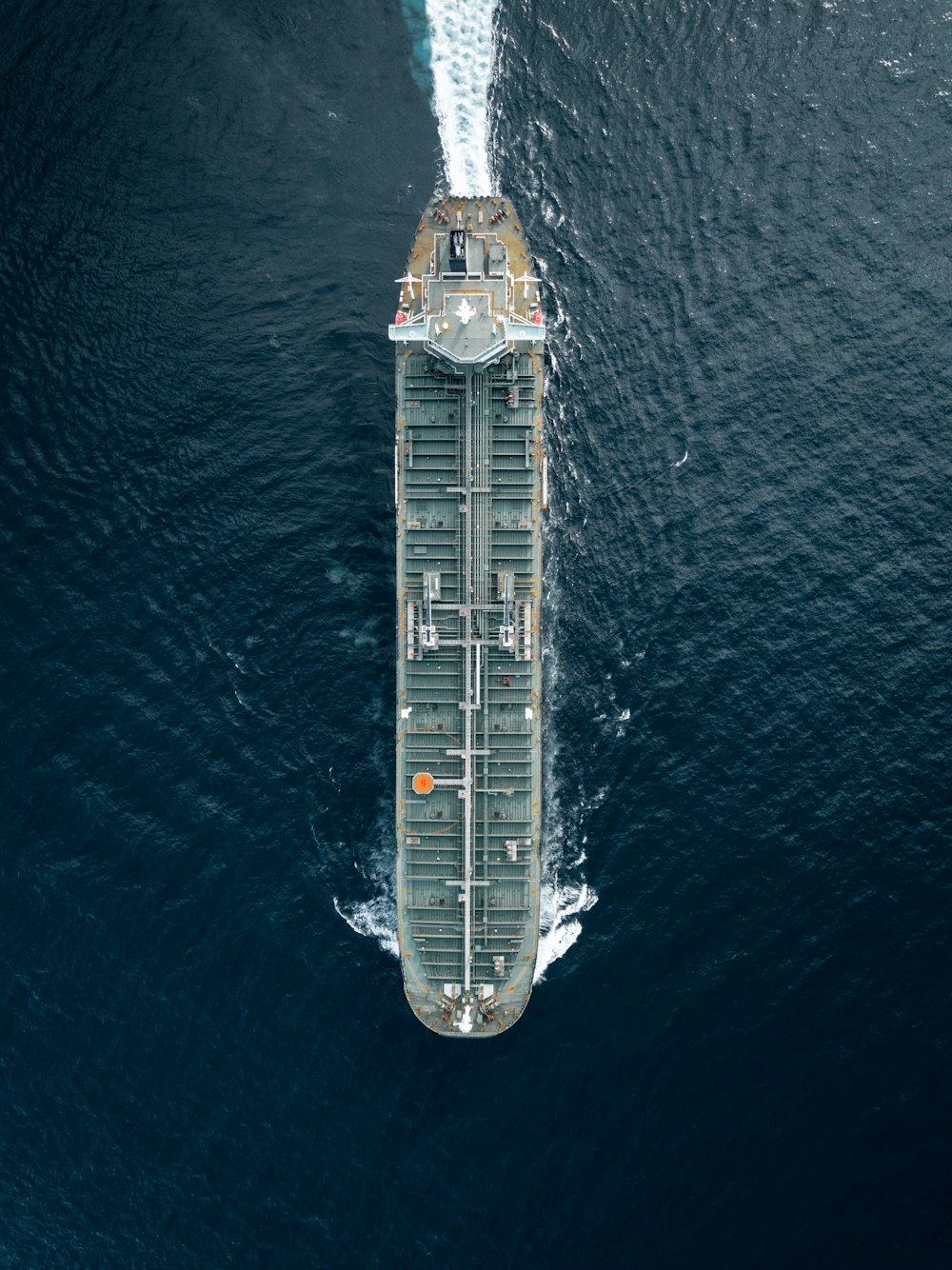 container ship cruising on the middle of the sea