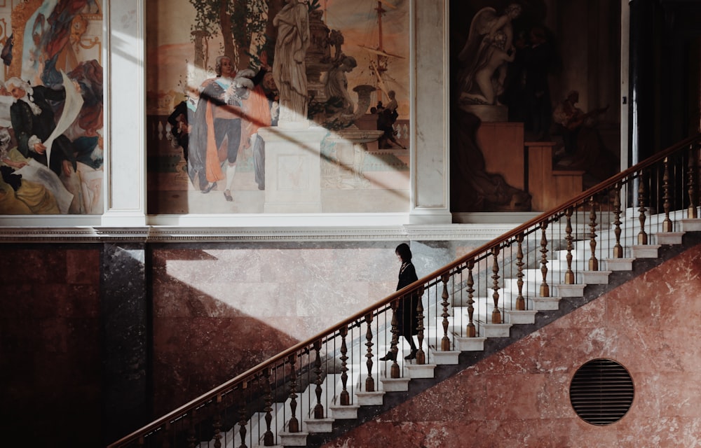 woman walking down stairs