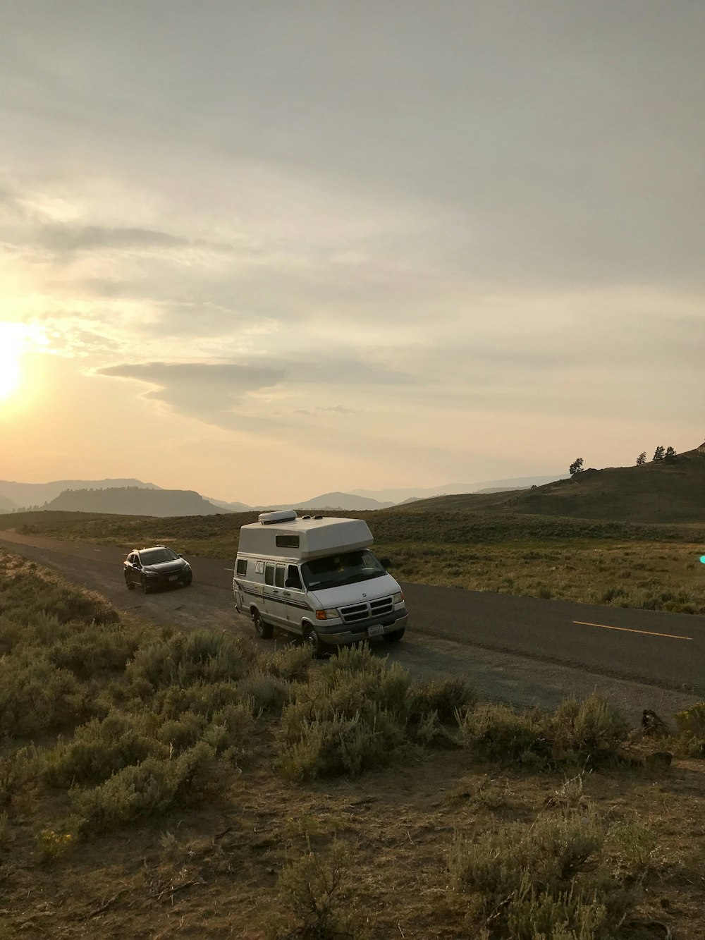 white van beside road