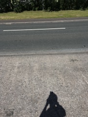 Sidewalk repair with fresh concrete and clean edges.